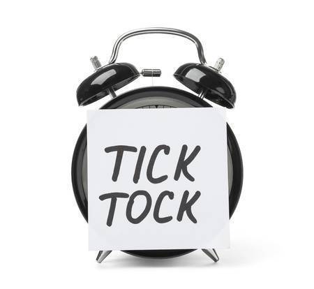 106103748-alarm-clock-and-sticky-note-with-words-tick-tock-on-white-background-time-concept.jpg